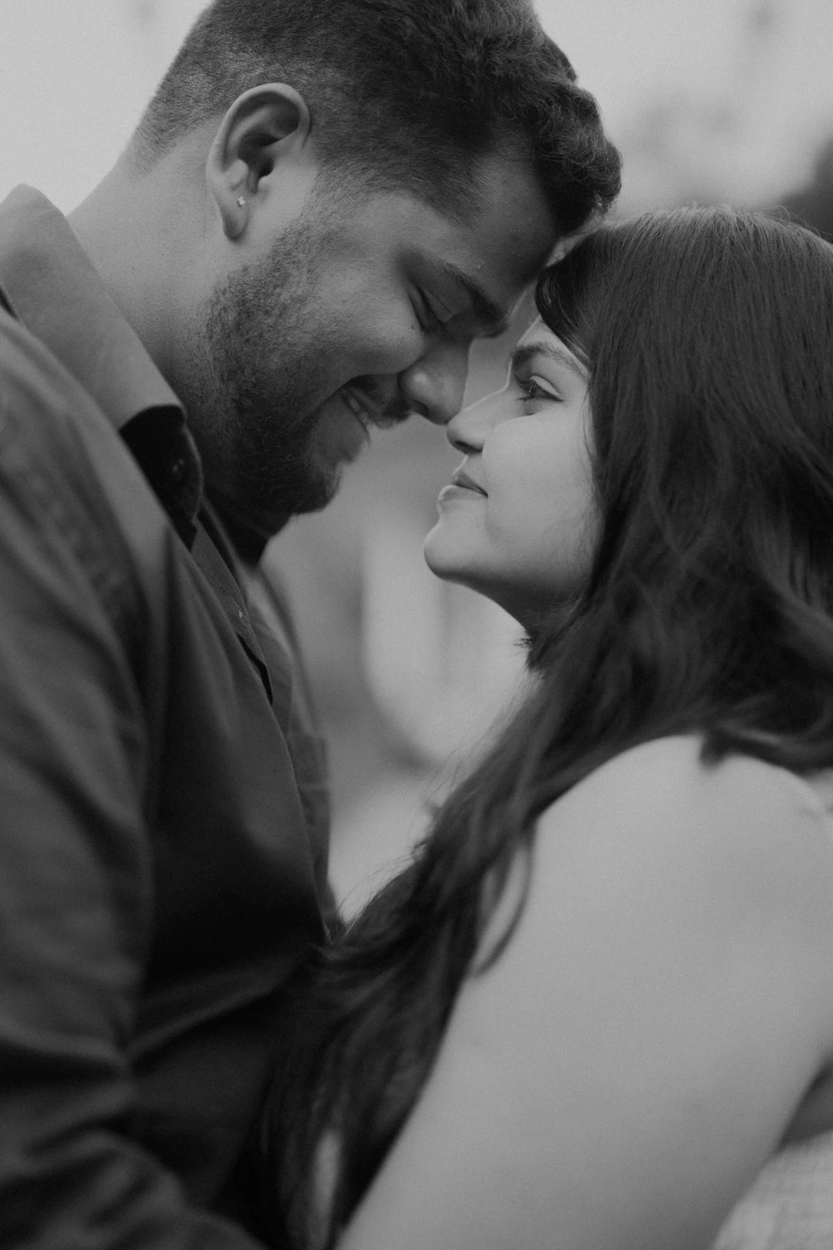 Rohan and Khushi sharing a quiet moment, black and white portrait